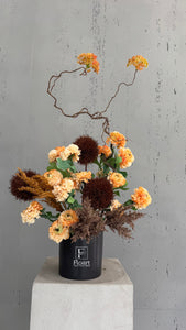 Création florale artificielle orange